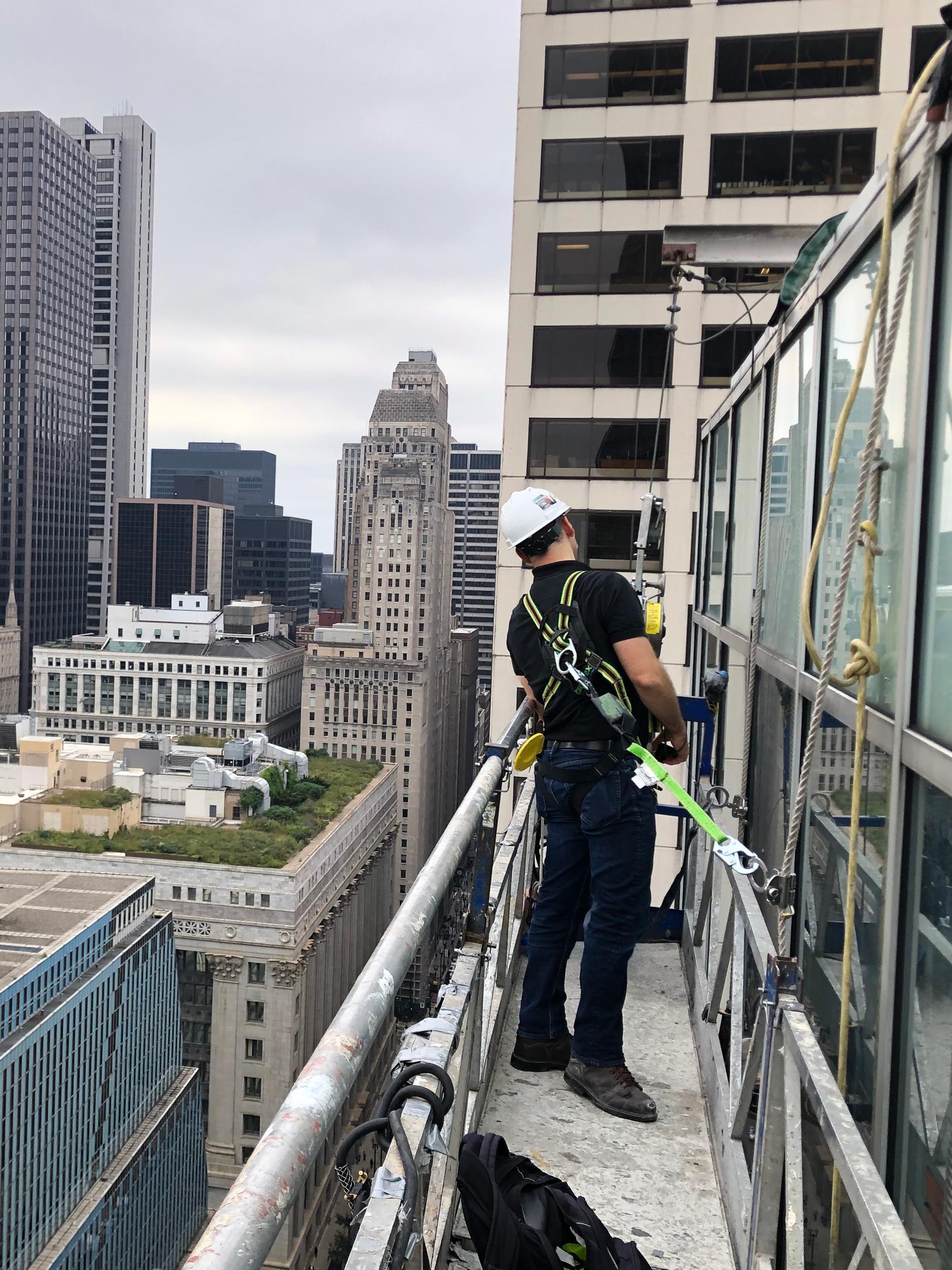 Field team examining an exterior building assembly