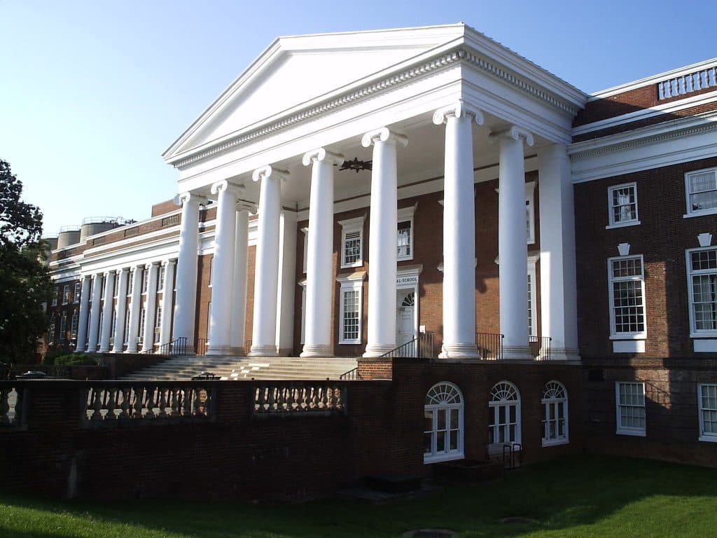 Historic institutional building with a white colonnade