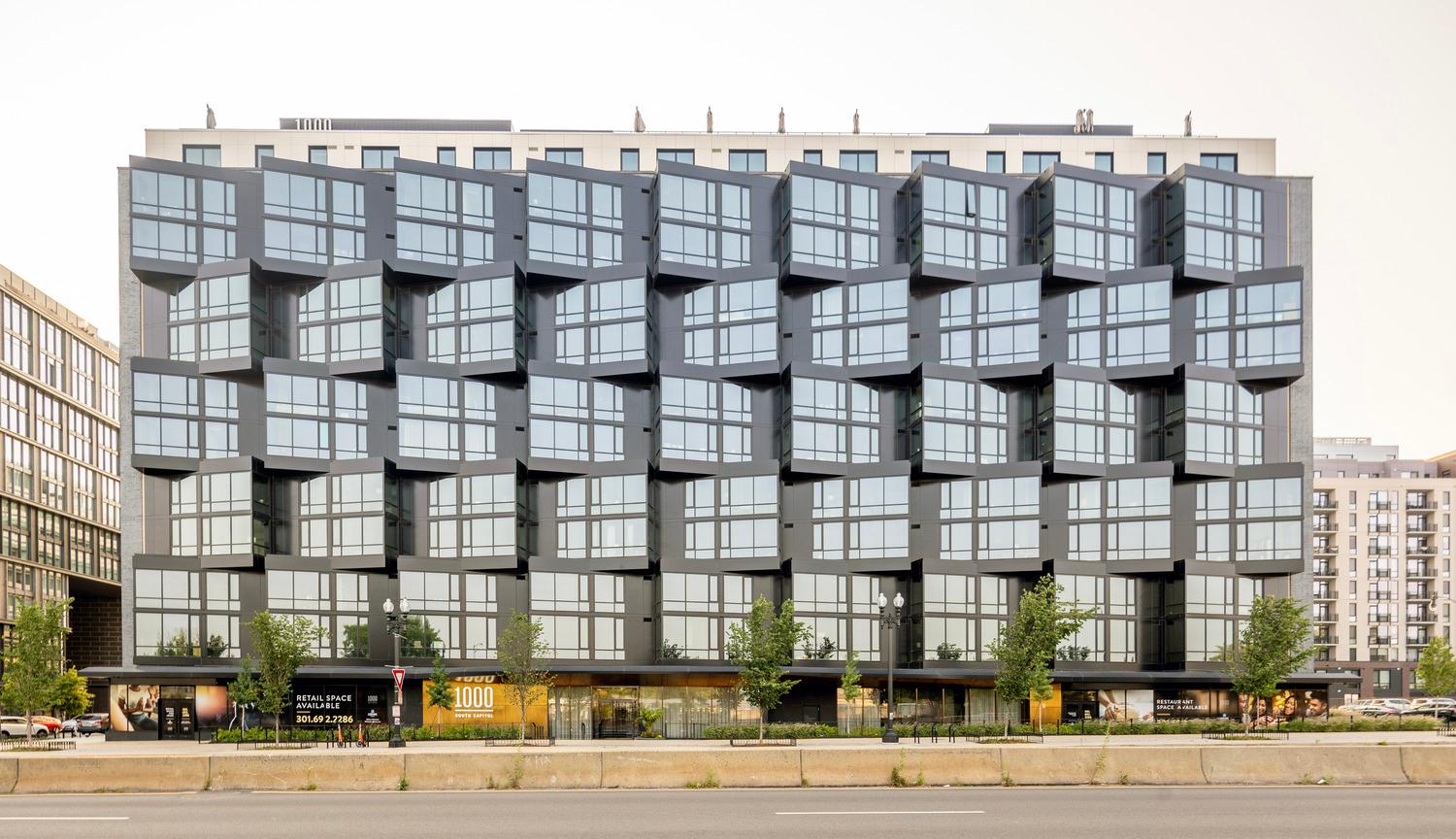 Contemporary residential building with a deeply articulated facade